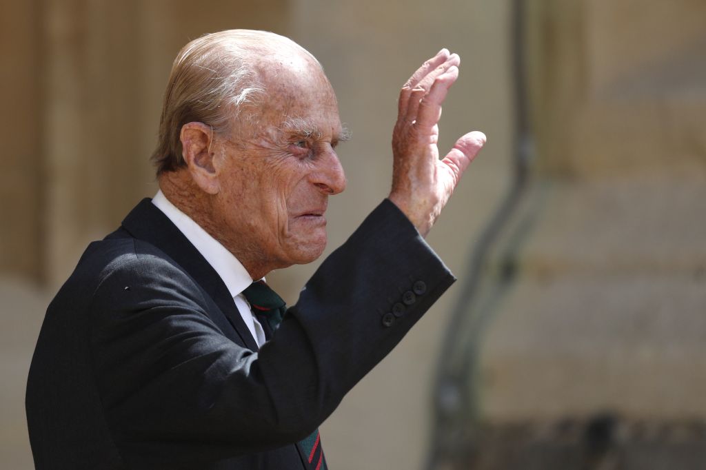Britain&apos;s Prince Philip, Duke of Edinburgh waves as he takes part in the transfer of the Colonel-in-Chief of The Rifles at Windsor castle in Windsor on July 22, 2020.